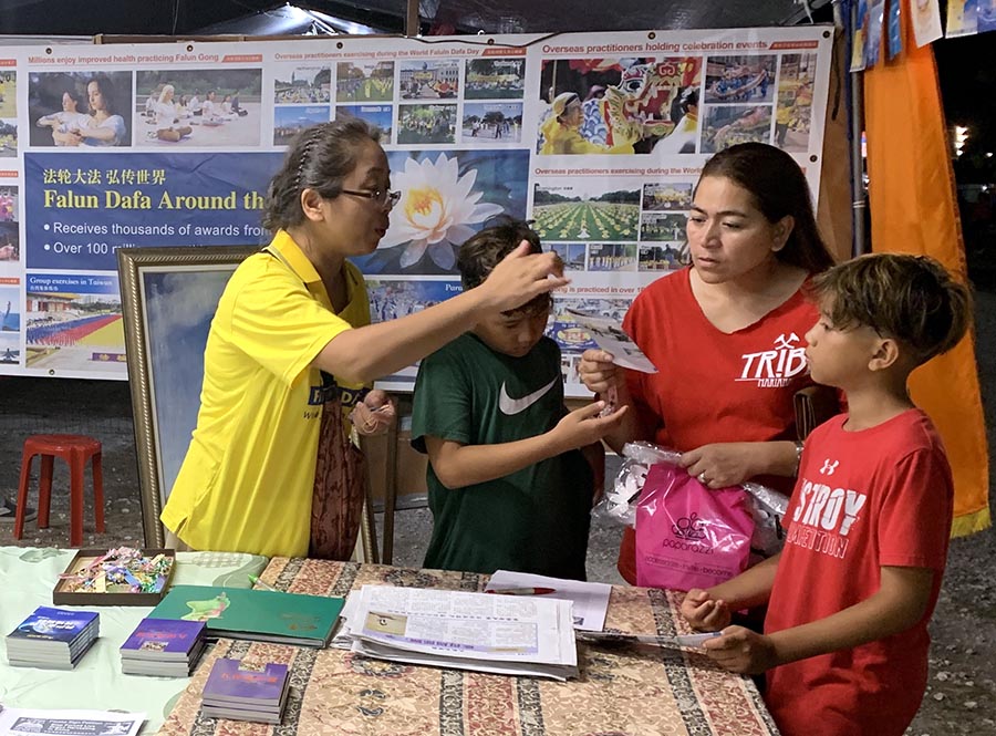 Image for article Les pratiquants de Falun Dafa participent au Festival des arts de Saipan