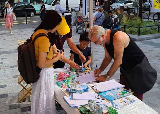 Image for article France : Les habitants de la banlieue sud de Paris condamnent la persécution du Falun Dafa par le PCC